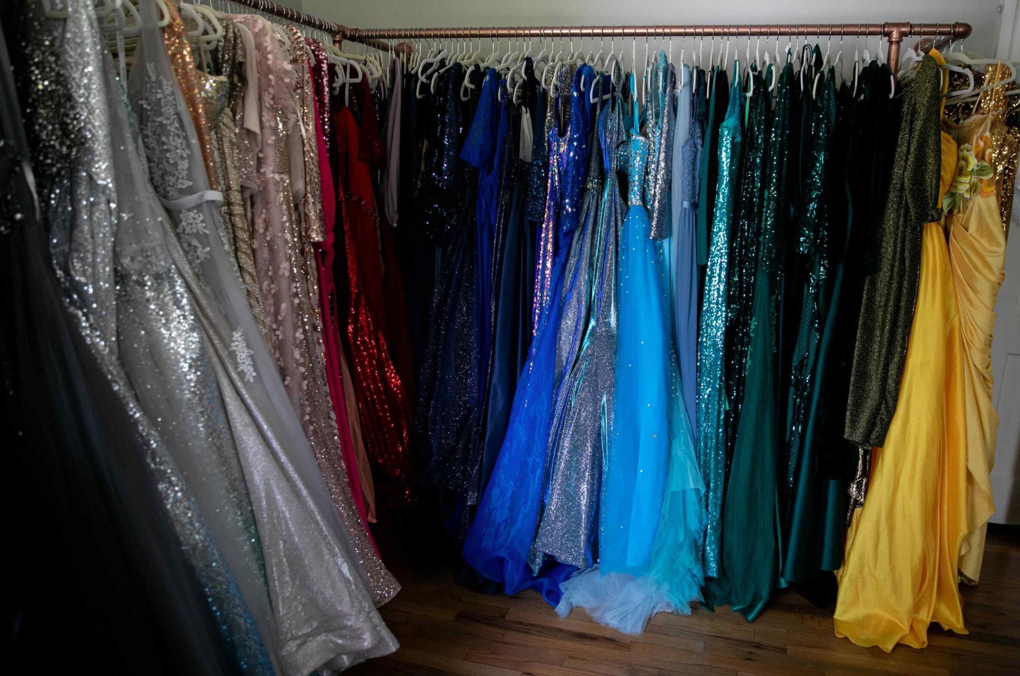 a closet full of glamorous gowns